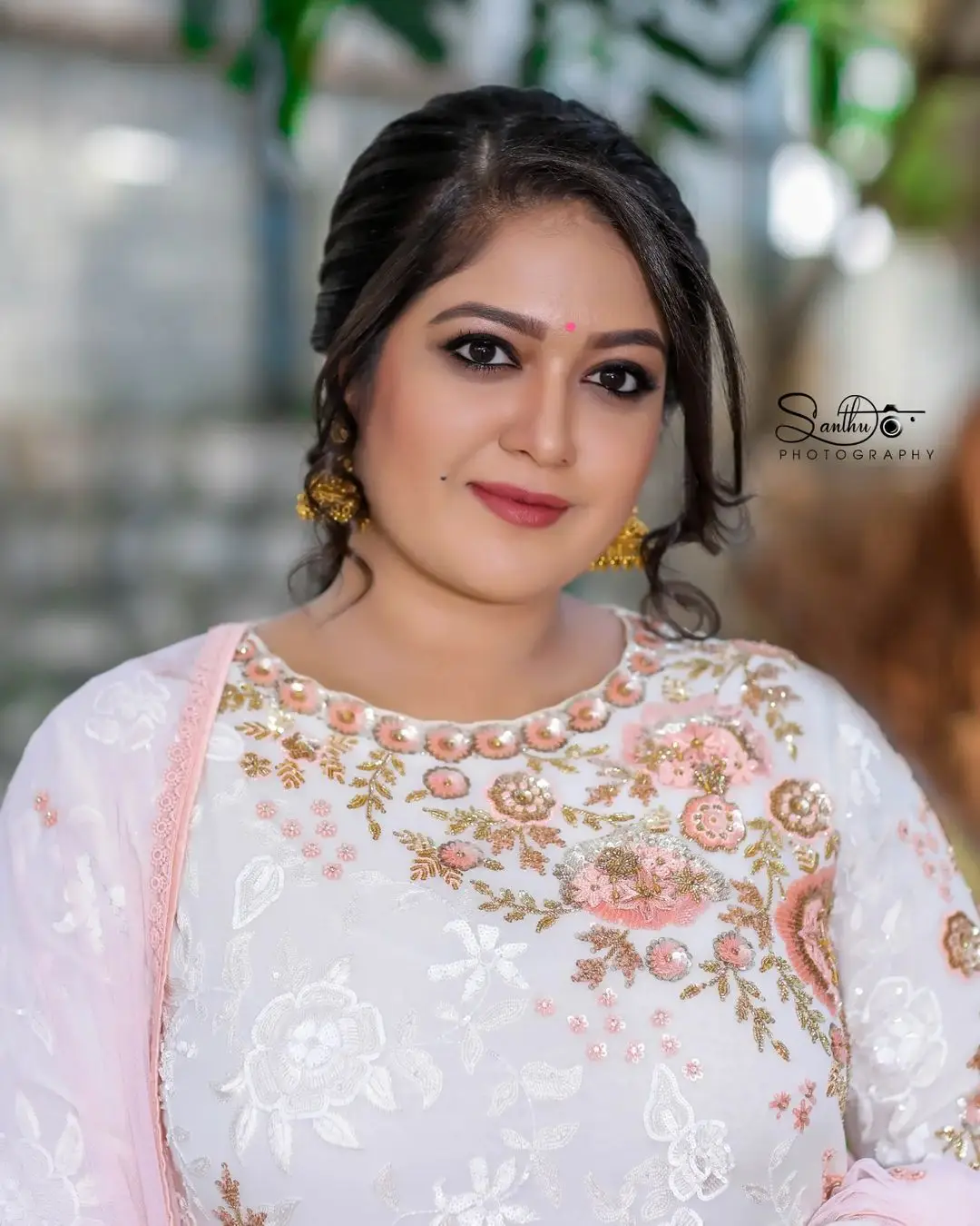 Meghana Raj Wearing Beautiful Earring White Designer Gown